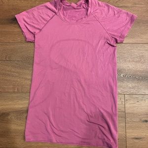 Size 6 Fuchsia run swiftly top. GUC